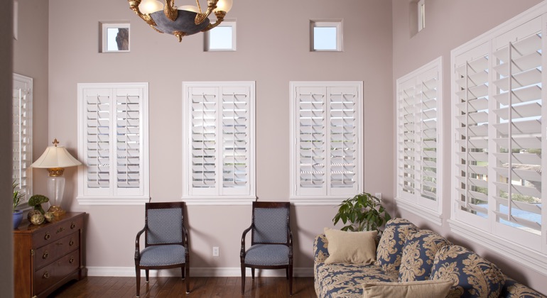 Chic parlor with classic shutters