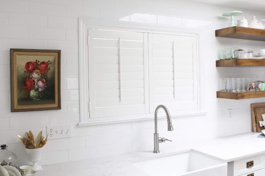 Polywood shutters over a kitchen sink